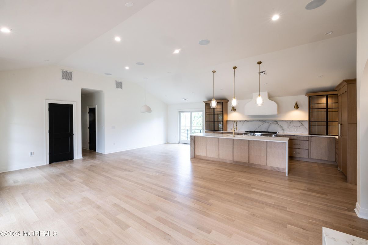 Interior, Kitchen, Marble Walls, Pendant Lights, Recessed Lighting, Wood Texture Flooring