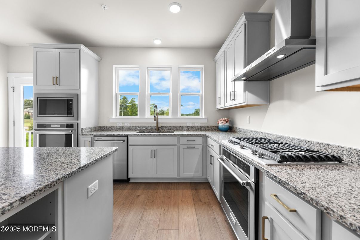 Interior, Kitchen, Recessed Lighting, Stainless Steel Appliances, Water, Wood Texture Flooring