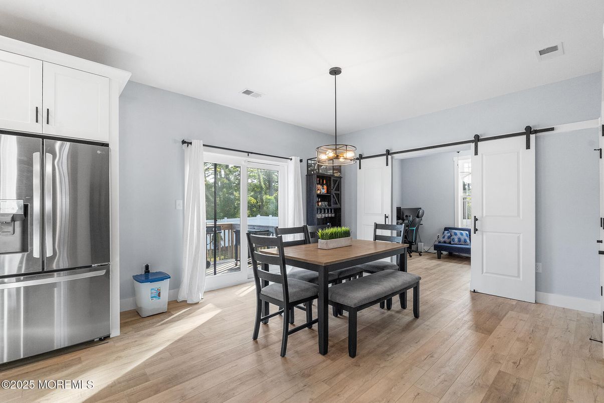 Dining room, Interior, Pendant Lights, Stainless Steel Appliances, Wood Texture Flooring