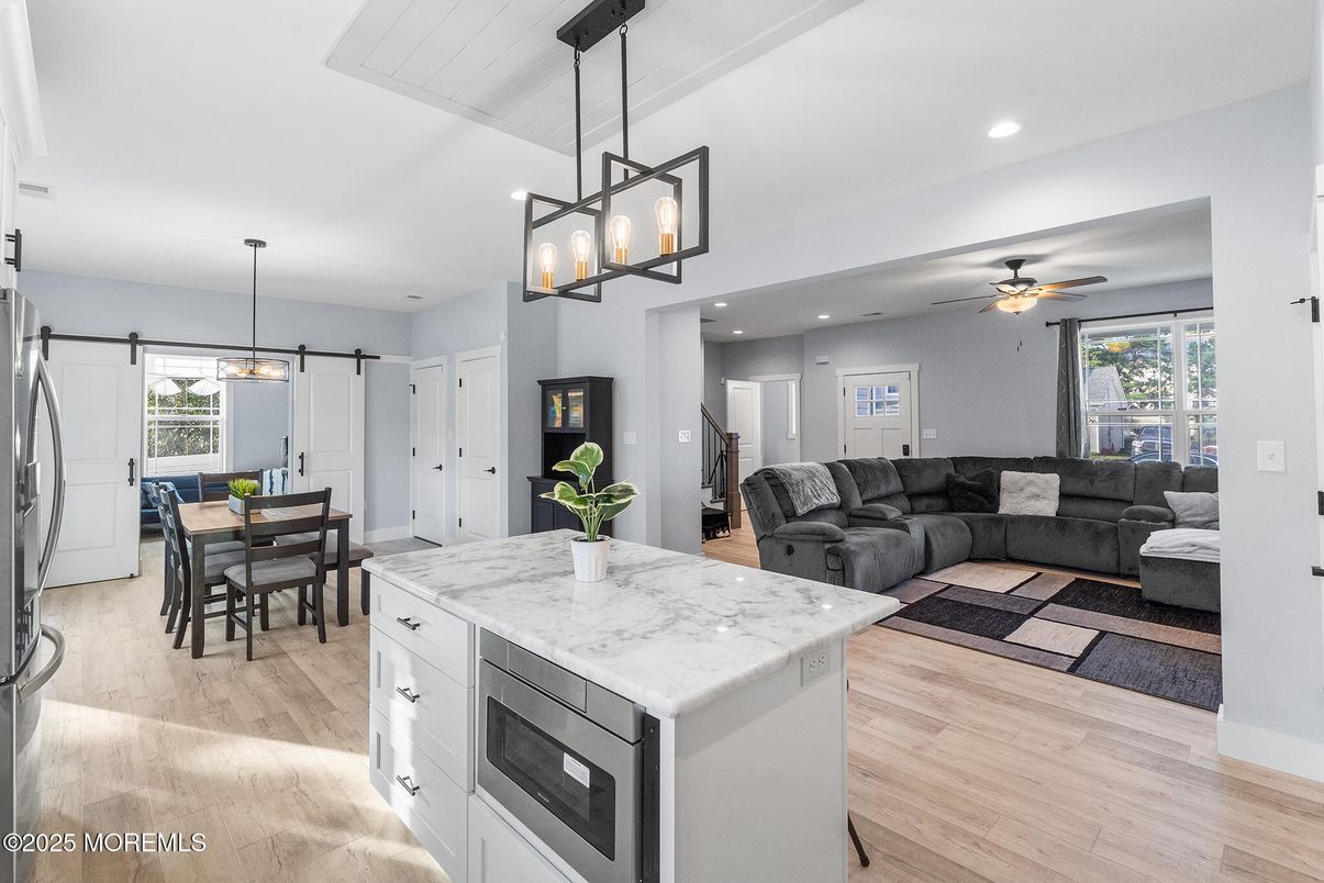 Dining room, Interior, Kitchen, Living room, Pendant Lights, Recessed Lighting, Wood Texture Flooring