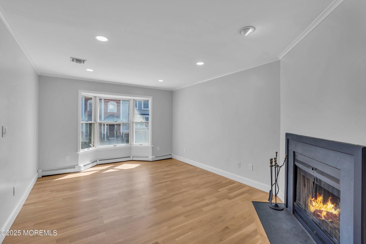Empty room, Fireplace, Interior, Recessed Lighting, Wood Texture Flooring