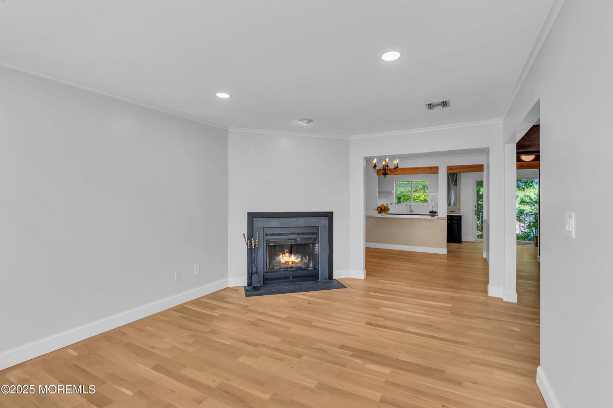 Empty room, Fireplace, Interior, Recessed Lighting, Wood Texture Flooring