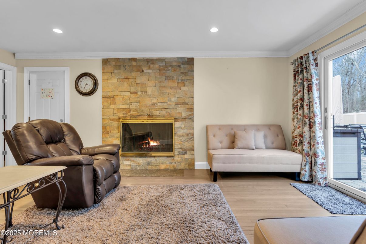 Fireplace, Interior, Recessed Lighting, Stone Walls, Wood Texture Flooring