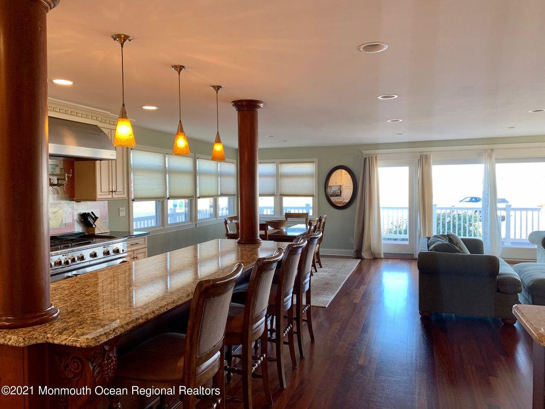 Dining room, Interior, Kitchen, Living room, Pendant Lights, Recessed Lighting, Stainless Steel Appliances, Wood Texture Flooring