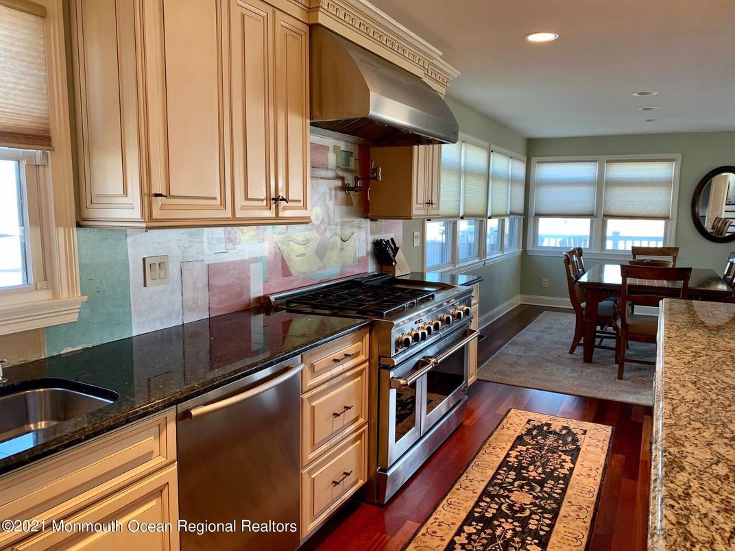 Dining room, Interior, Kitchen, Recessed Lighting, Stainless Steel Appliances, Wood Texture Flooring