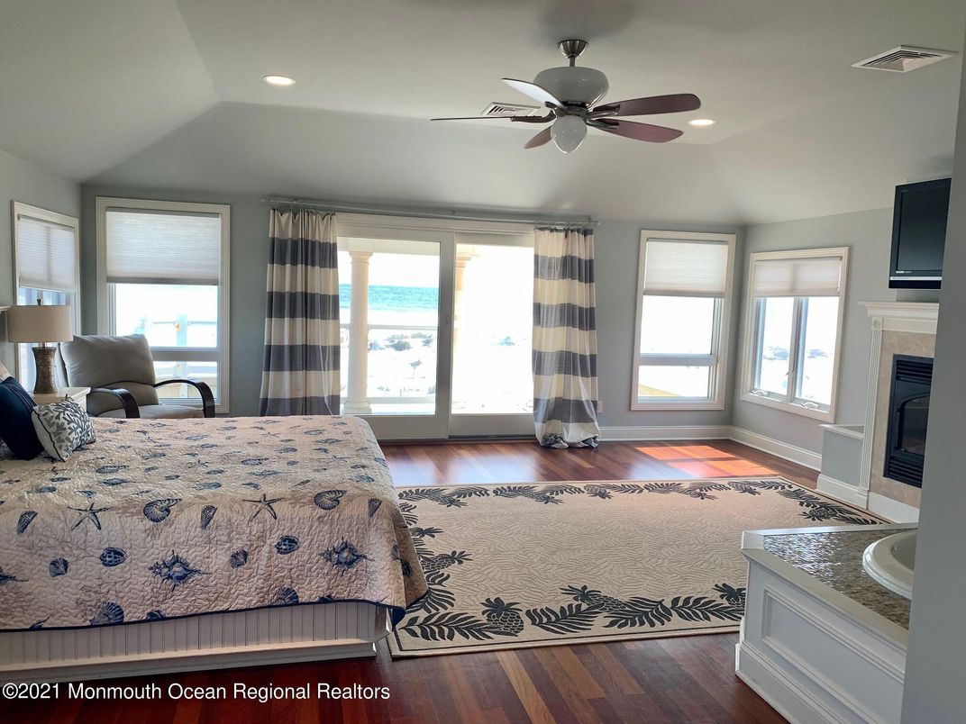 Bedroom, Fireplace, Interior, Recessed Lighting, Wood Texture Flooring