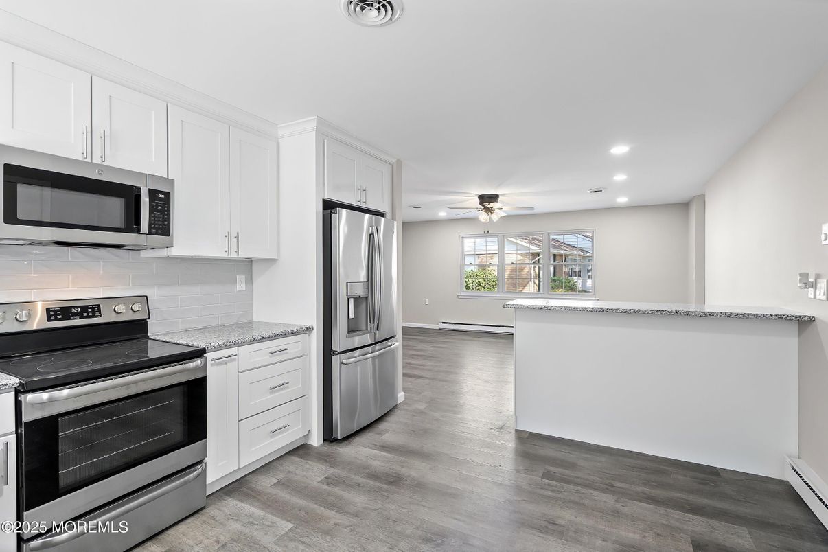 Interior, Kitchen, Recessed Lighting, Stainless Steel Appliances, Wood Texture Flooring