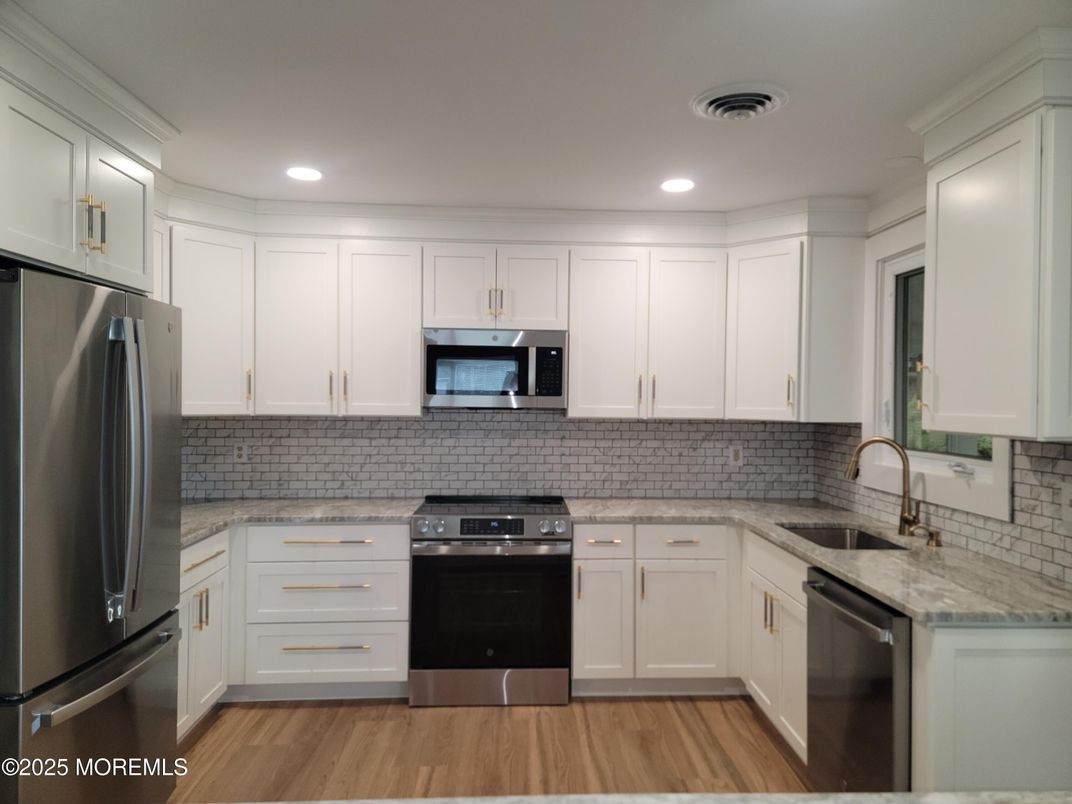 Interior, Kitchen, Recessed Lighting, Stainless Steel Appliances, Wood Texture Flooring