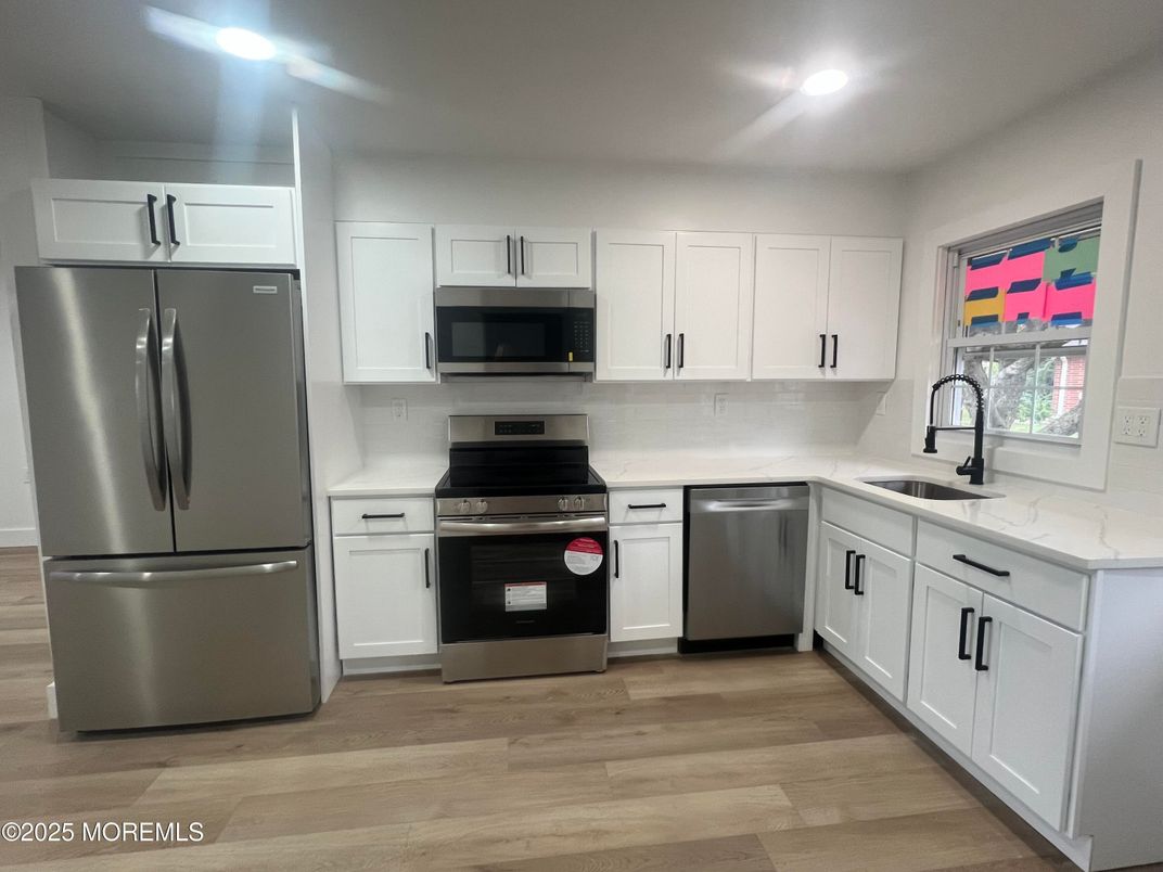Interior, Kitchen, Recessed Lighting, Stainless Steel Appliances, Wood Texture Flooring
