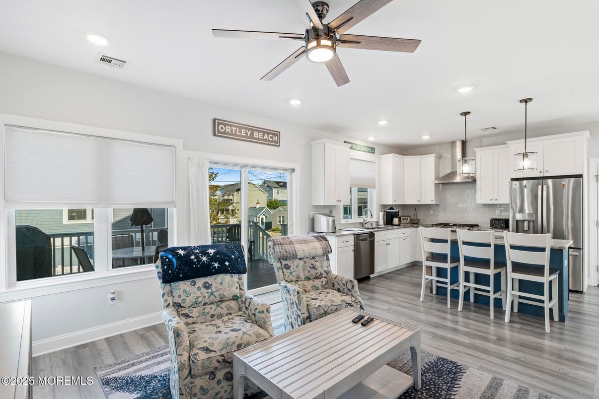 Dining room, Interior, Kitchen, Living room, Pendant Lights, Recessed Lighting, Stainless Steel Appliances, Wood Texture Flooring
