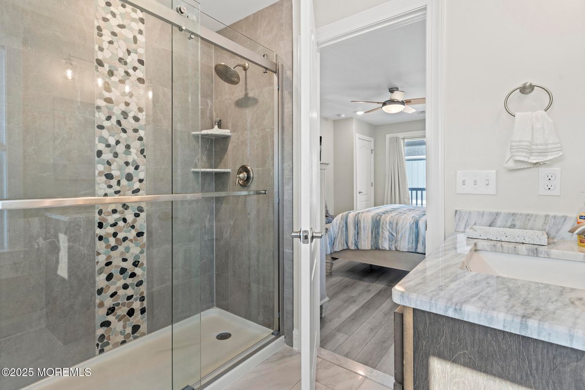 Bathroom, Bedroom, Glass Shower, Interior, Recessed Lighting, Wood Texture Flooring