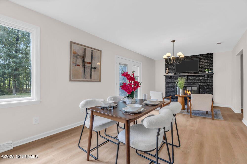 Chandelier, Dining room, Fireplace, Interior, Wood Texture Flooring