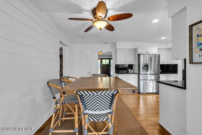 Dining room, Interior, Kitchen, Recessed Lighting, Stainless Steel Appliances, Wood Texture Flooring