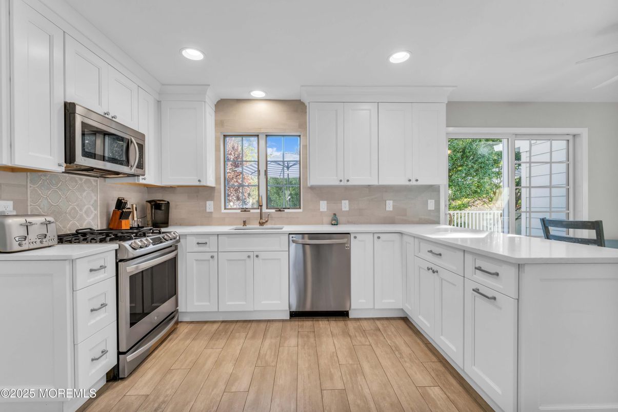 Interior, Kitchen, Recessed Lighting, Stainless Steel Appliances, Wood Texture Flooring