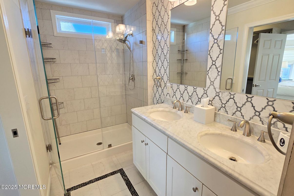 Bathroom, Dual Sink Vanities, Glass Shower, Interior, Marble Walls