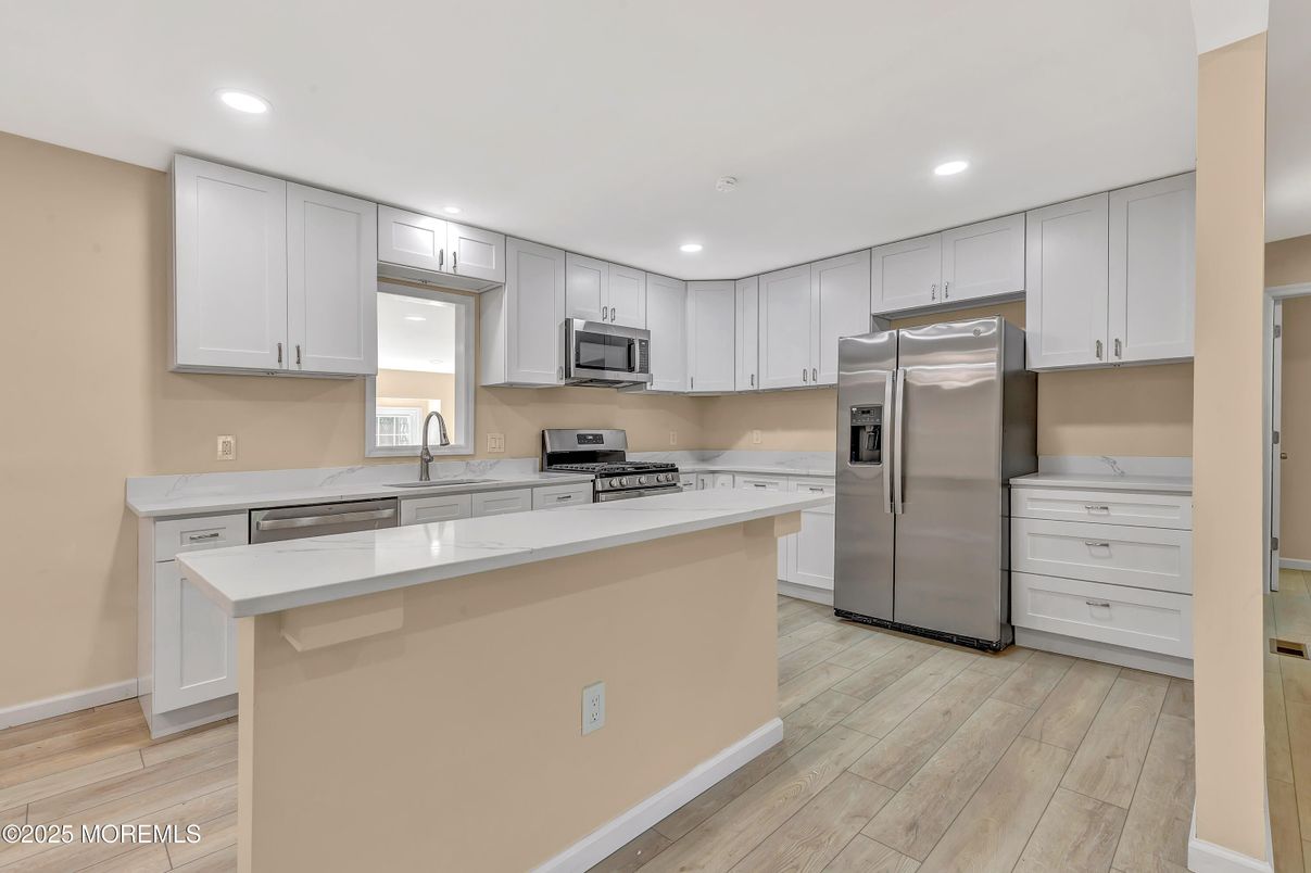 Interior, Kitchen, Recessed Lighting, Stainless Steel Appliances, Wood Texture Flooring