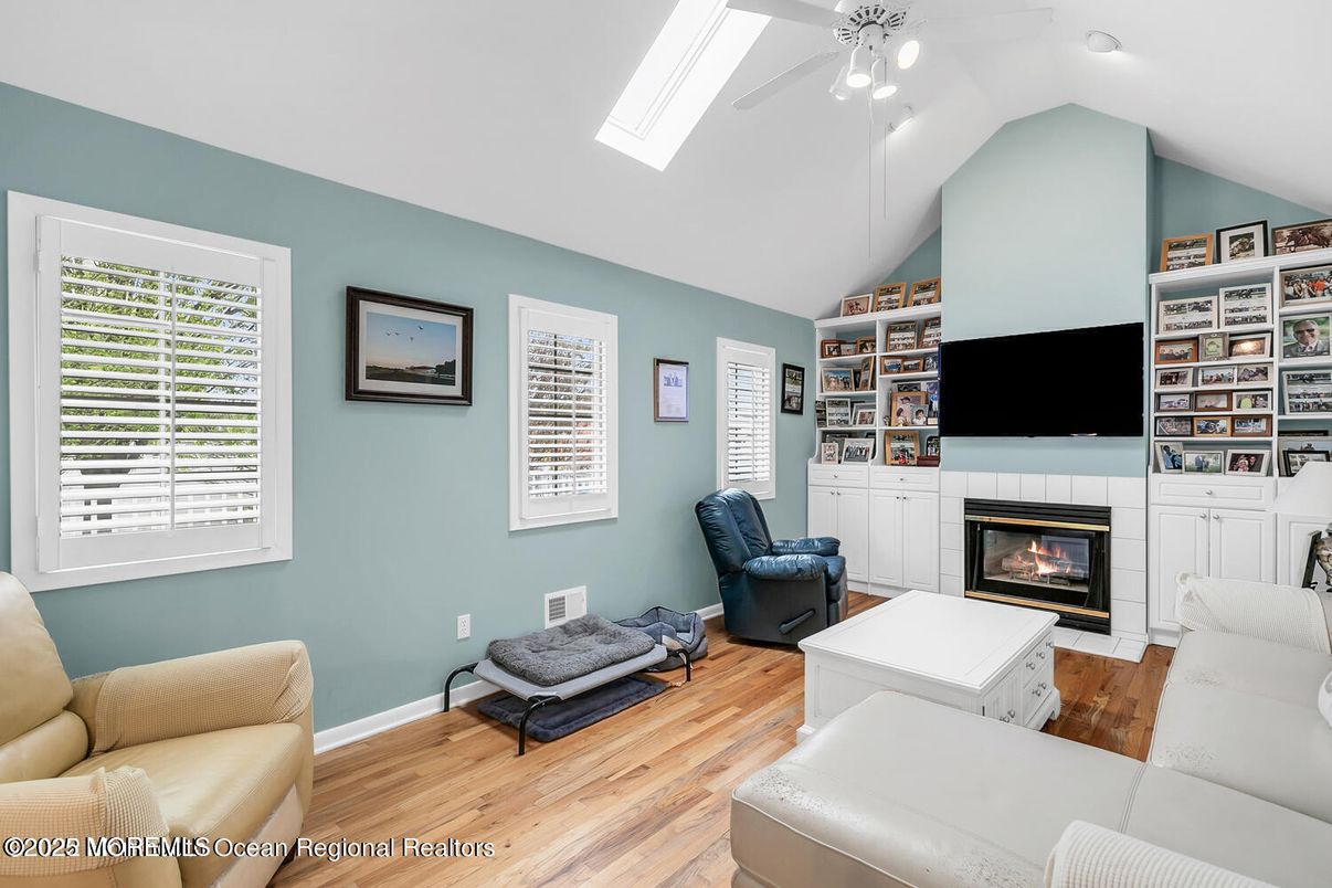 Fireplace, Interior, Living room, Recessed Lighting, Wood Texture Flooring
