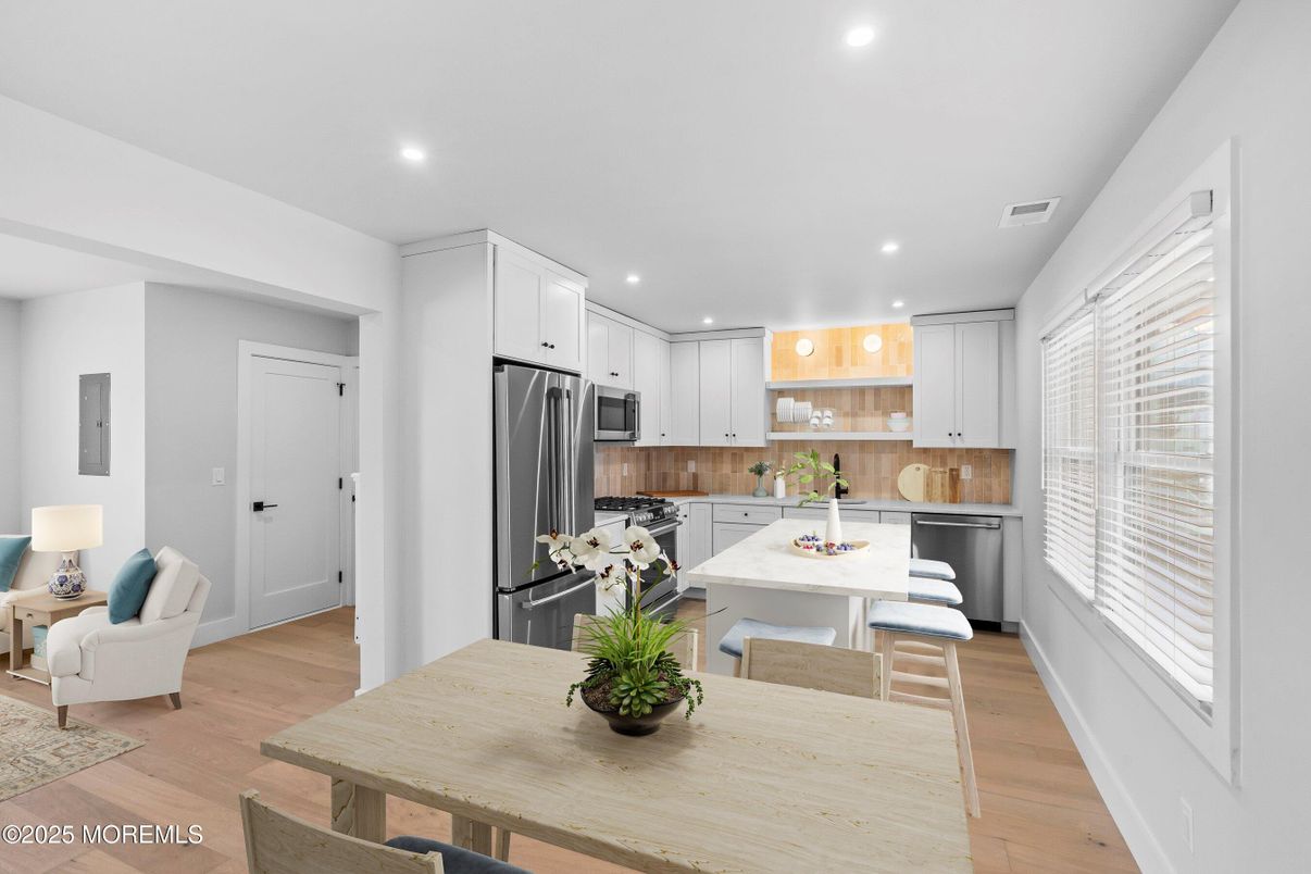 Dining room, Interior, Kitchen, Recessed Lighting, Stainless Steel Appliances, Wood Texture Flooring