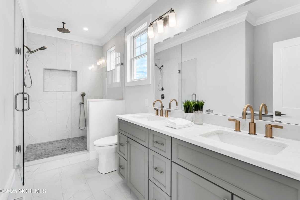 Bathroom, Dual Sink Vanities, Glass Shower, Interior, Marble, Marble Walls, Recessed Lighting