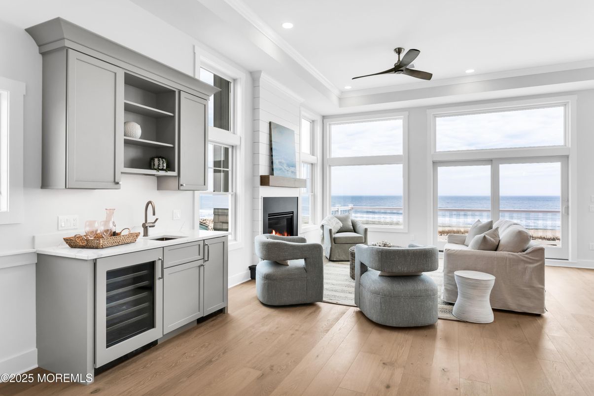 Fireplace, Interior, Living room, Recessed Lighting, Water, Wood Texture Flooring
