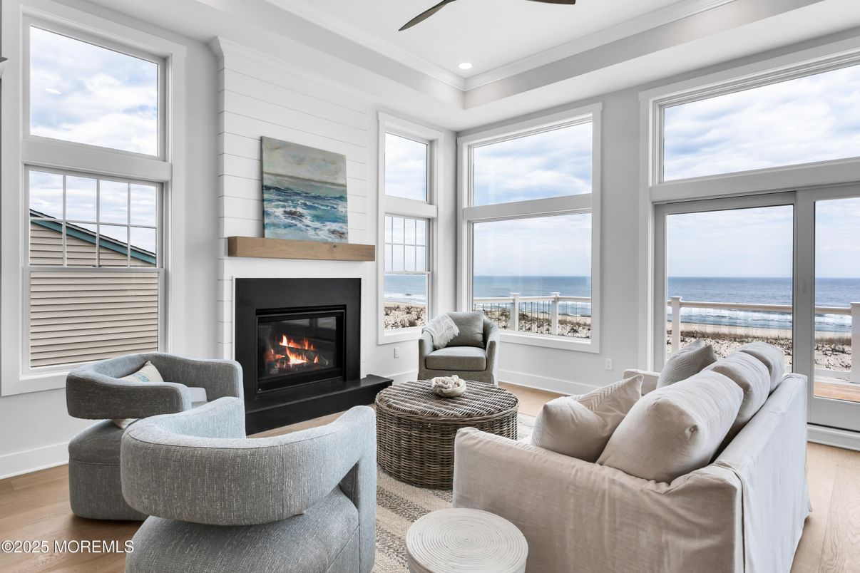 Fireplace, Interior, Living room, Recessed Lighting, Water, Wood Texture Flooring