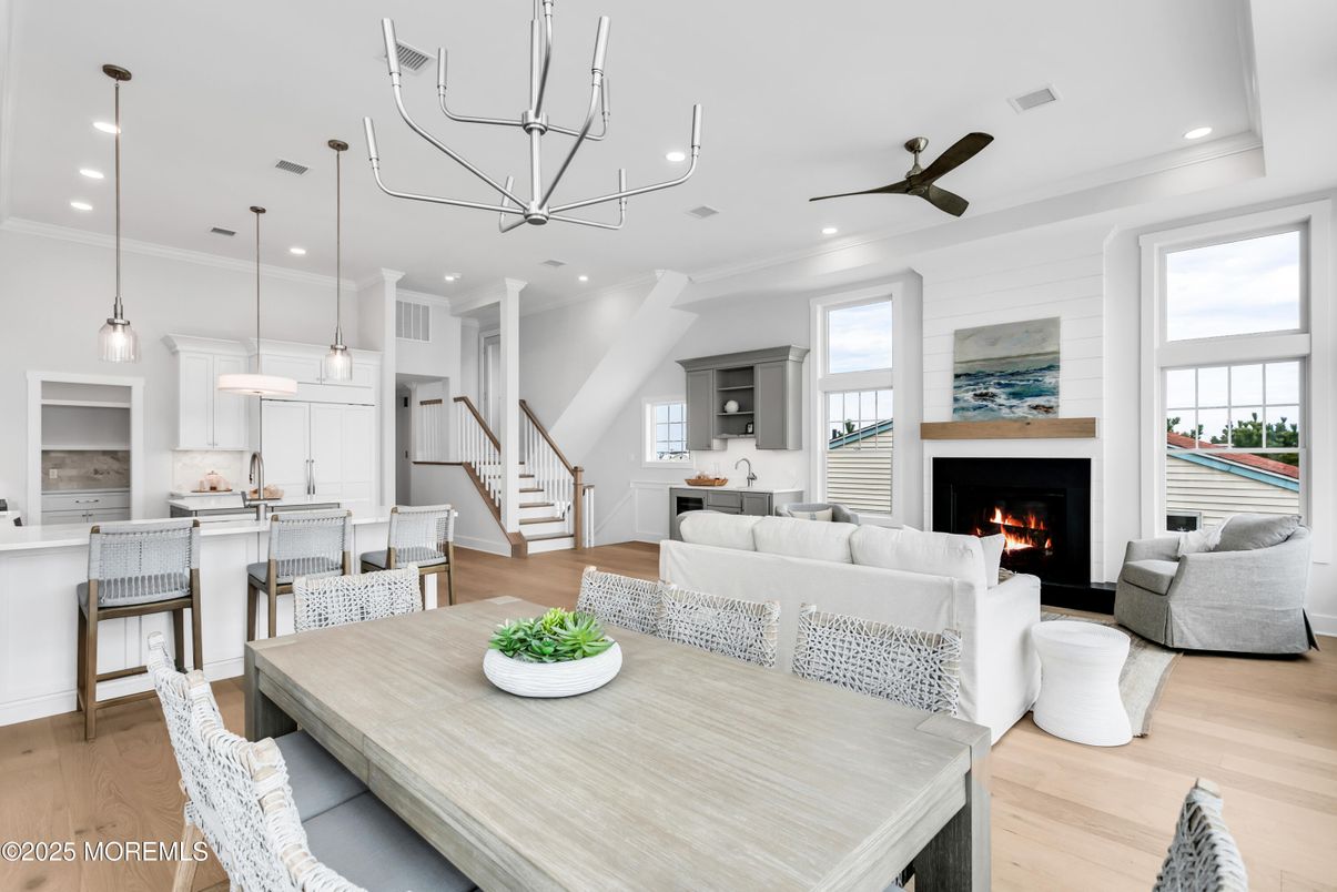 Dining room, Fireplace, Interior, Kitchen, Living room, Pendant Lights, Recessed Lighting, Wood Texture Flooring