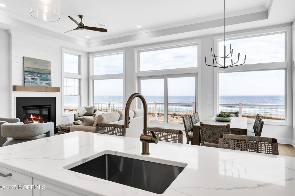 Chandelier, Dining room, Fireplace, Interior, Kitchen, Living room, Pendant Lights, Recessed Lighting, Water