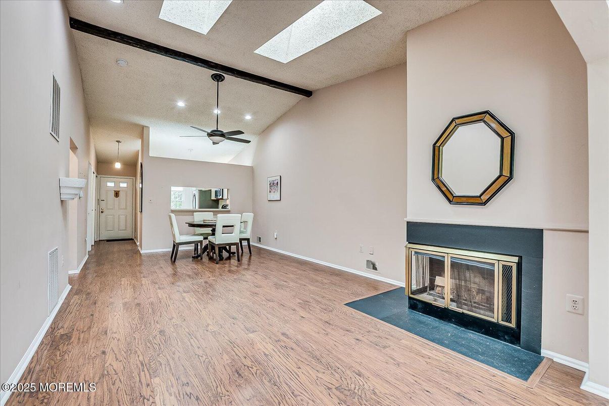 Dining room, Fireplace, Interior, Recessed Lighting, Wood Texture Flooring