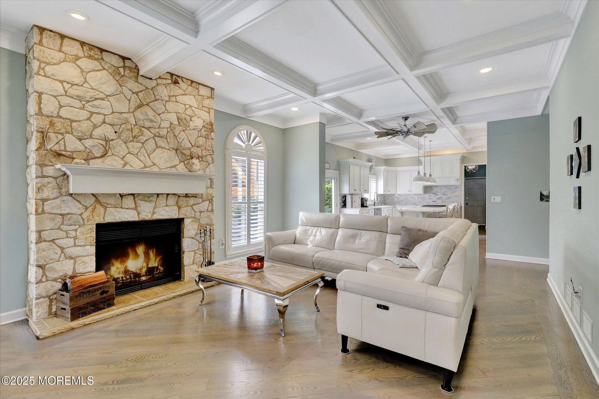 Fireplace, Interior, Kitchen, Living room, Recessed Lighting, Stone Walls, Wood Texture Flooring