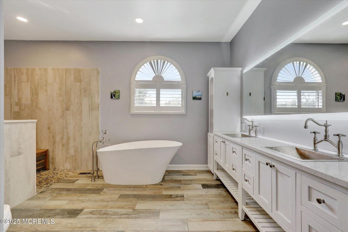 Bathroom, Dual Sink Vanities, Free Standing Baths, Interior, Recessed Lighting, Wood Texture Flooring