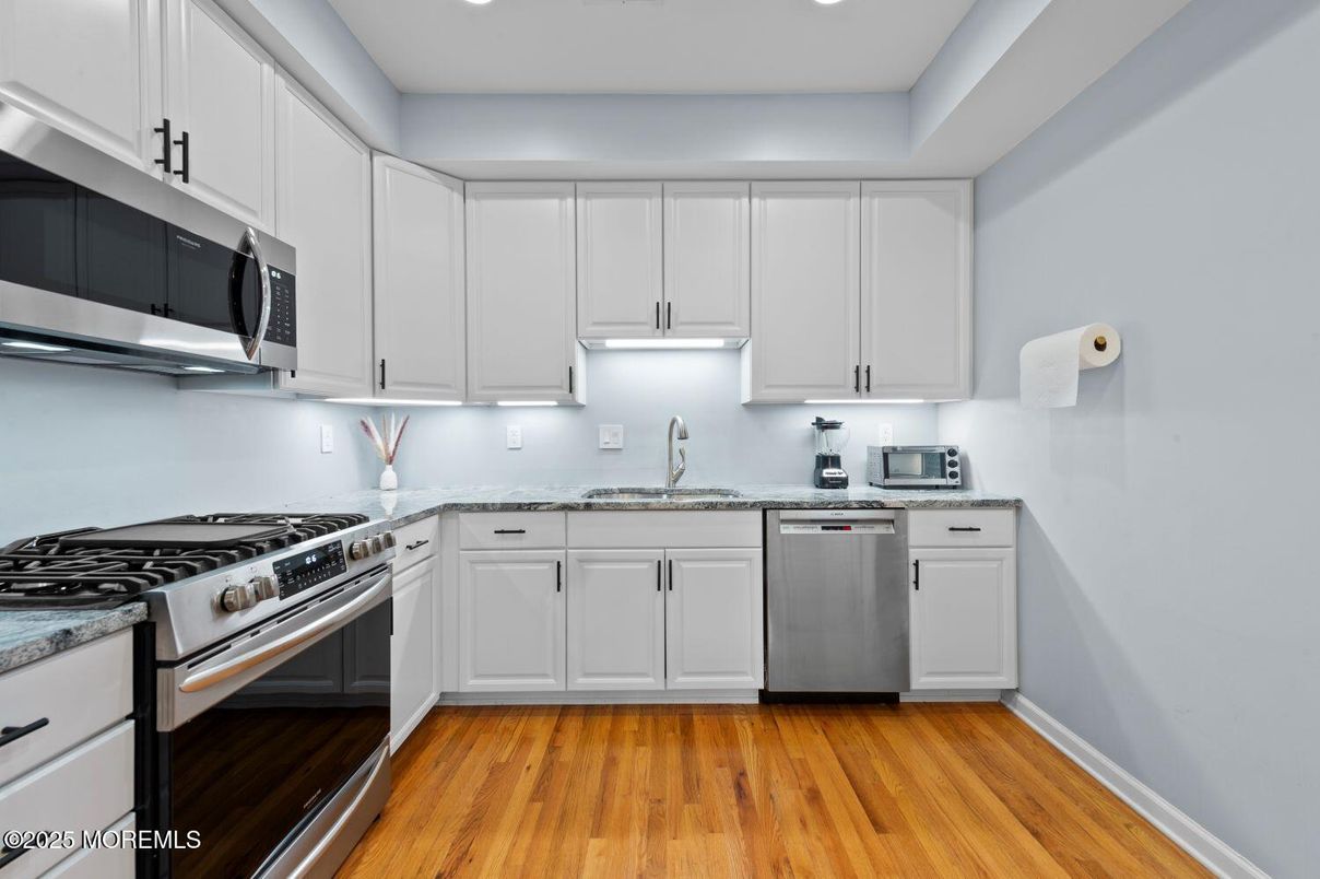 Interior, Kitchen, Recessed Lighting, Stainless Steel Appliances, Wood Texture Flooring