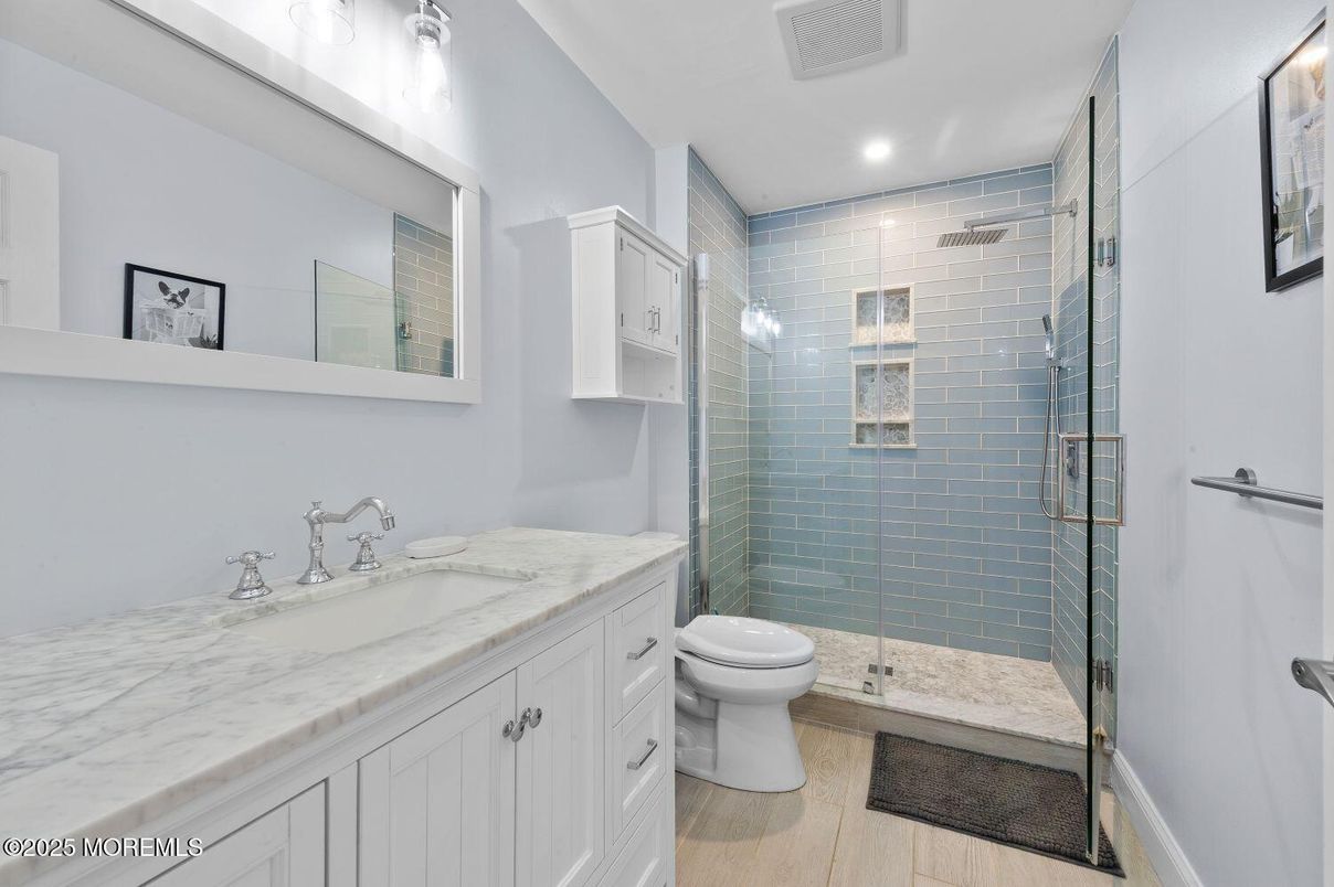 Bathroom, Glass Shower, Interior, Recessed Lighting, Wood Texture Flooring