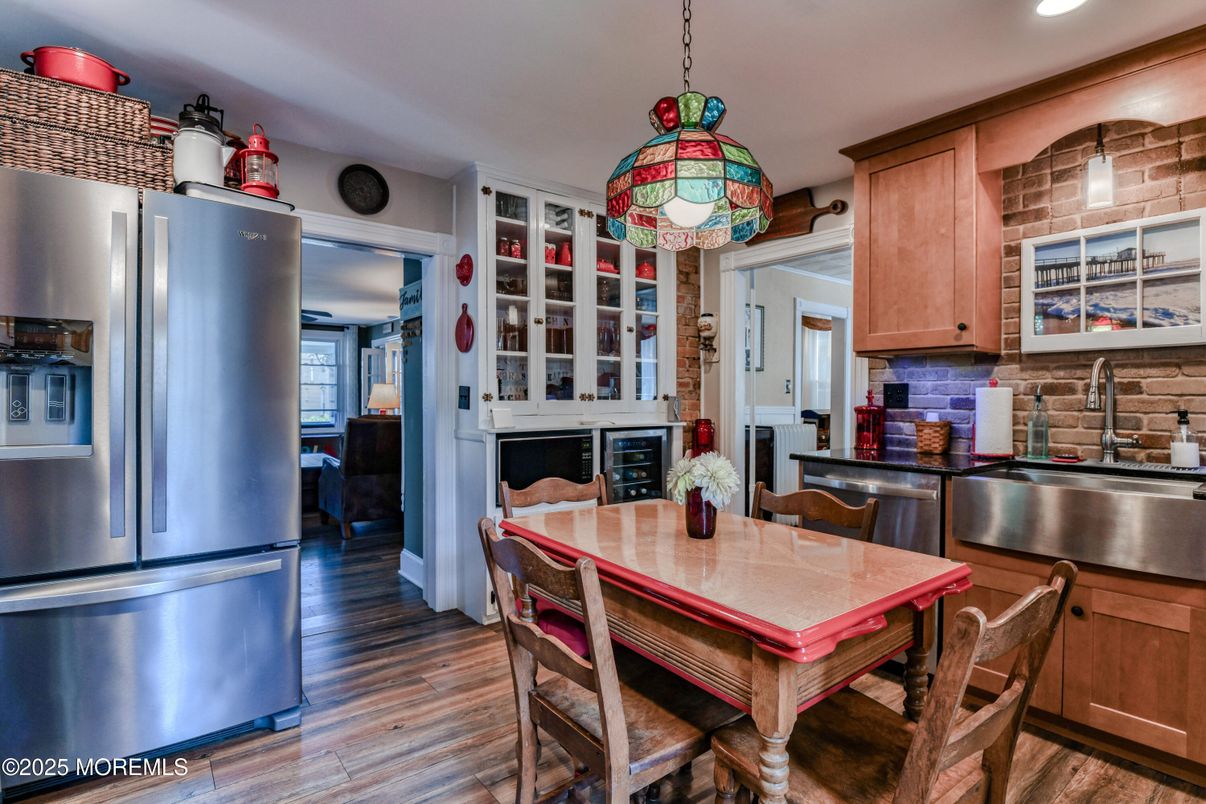 Dining room, Interior, Kitchen, Pendant Lights, Recessed Lighting, Stainless Steel Appliances, Wood Texture Flooring