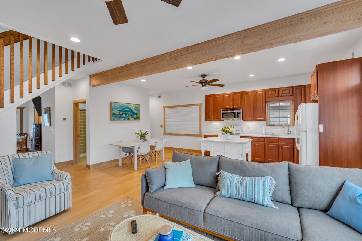 Dining room, Interior, Kitchen, Living room, Recessed Lighting, Stainless Steel Appliances, Wooden Beams, Wood Texture Flooring