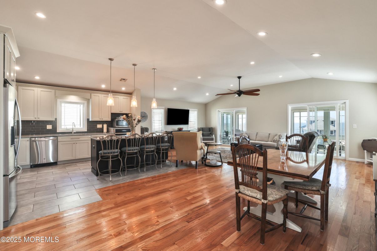 Dining room, Interior, Kitchen, Living room, Pendant Lights, Recessed Lighting, Stainless Steel Appliances, Wood Texture Flooring