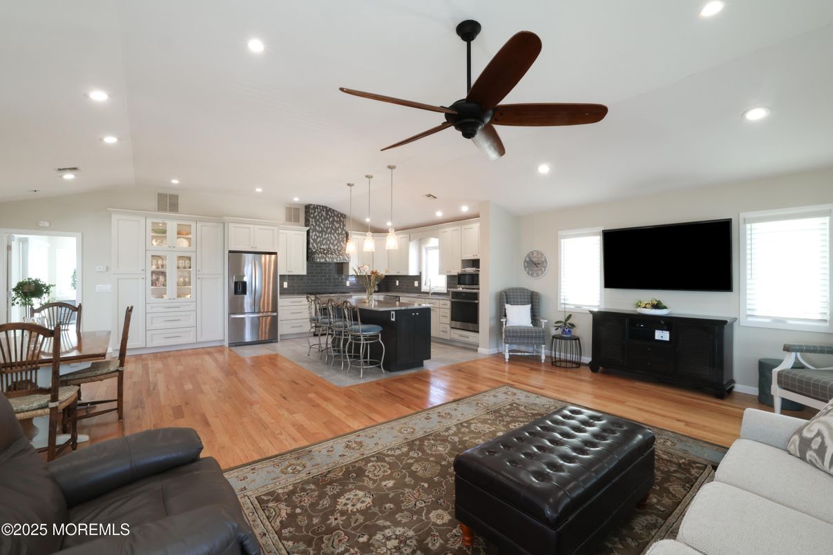 Dining room, Interior, Kitchen, Living room, Pendant Lights, Recessed Lighting, Stainless Steel Appliances, Wood Texture Flooring
