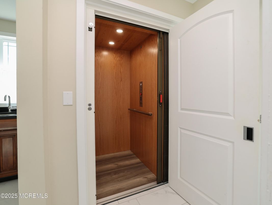 Elevator, Interior, Marble, Recessed Lighting, Wooden Ceilings, Wood Texture Flooring, Wooden Walls