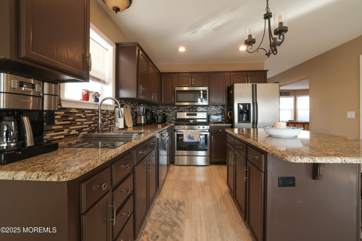Chandelier, Interior, Kitchen, Recessed Lighting, Stainless Steel Appliances, Wood Texture Flooring