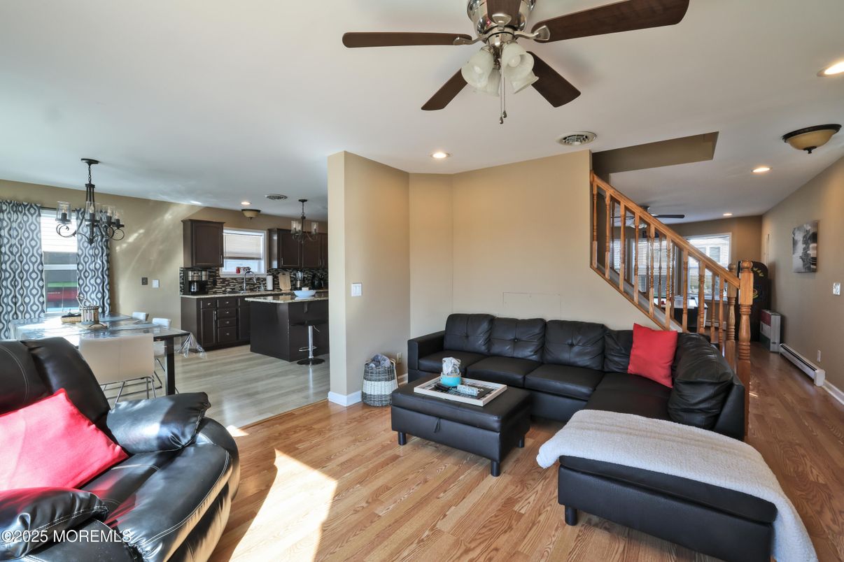 Chandelier, Dining room, Interior, Kitchen, Living room, Pendant Lights, Recessed Lighting, Wood Texture Flooring