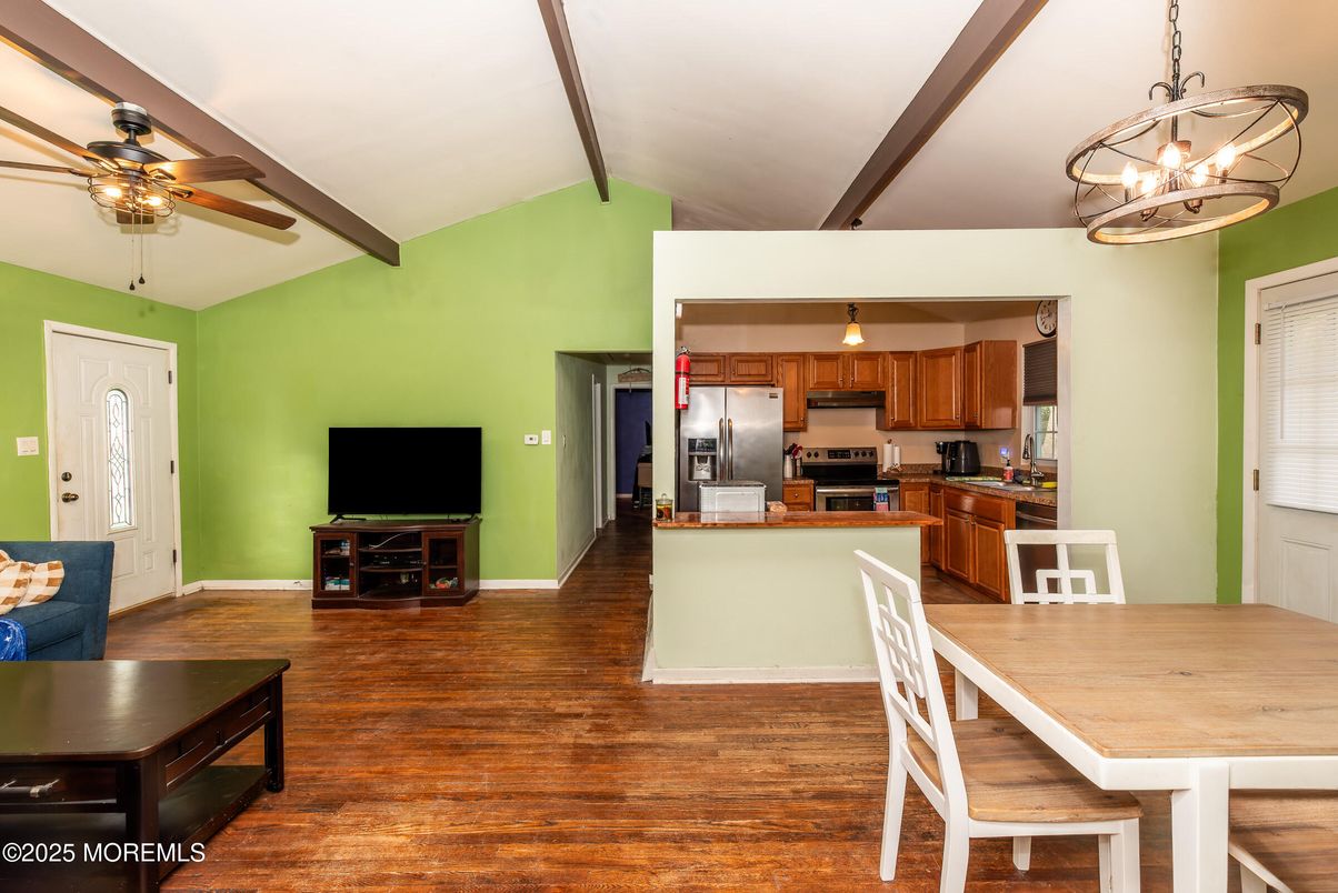 Chandelier, Dining room, Interior, Kitchen, Pendant Lights, Stainless Steel Appliances, Wood Texture Flooring