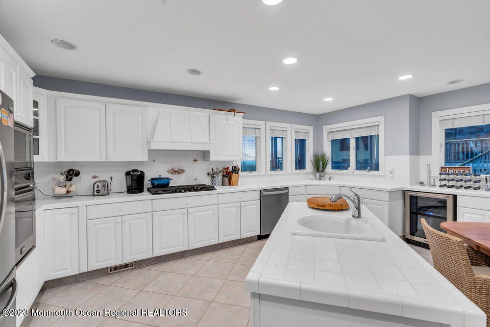 Interior, Kitchen, Recessed Lighting, Stainless Steel Appliances, Tile Countertops