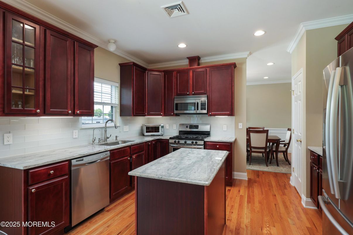Dining room, Interior, Kitchen, Recessed Lighting, Stainless Steel Appliances, Wood Texture Flooring