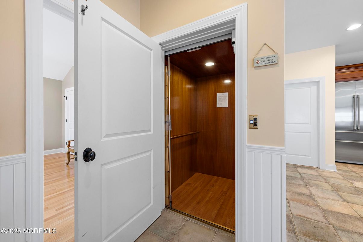 Elevator, Interior, Recessed Lighting, Wooden Ceilings, Wood Texture Flooring, Wooden Walls