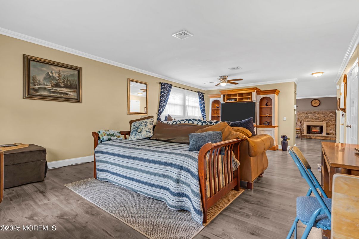 Bedroom, Dining room, Fireplace, Interior, Wood Texture Flooring