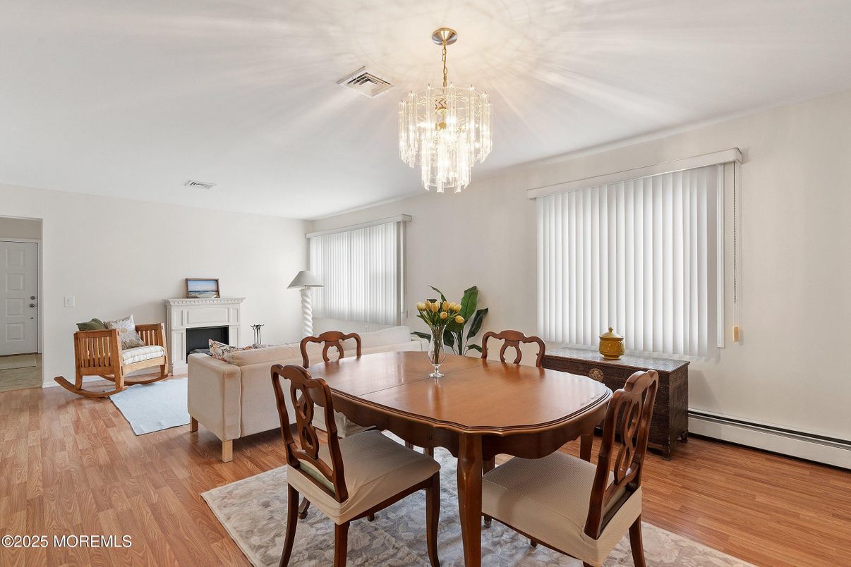 Chandelier, Dining room, Fireplace, Interior, Living room, Wood Texture Flooring