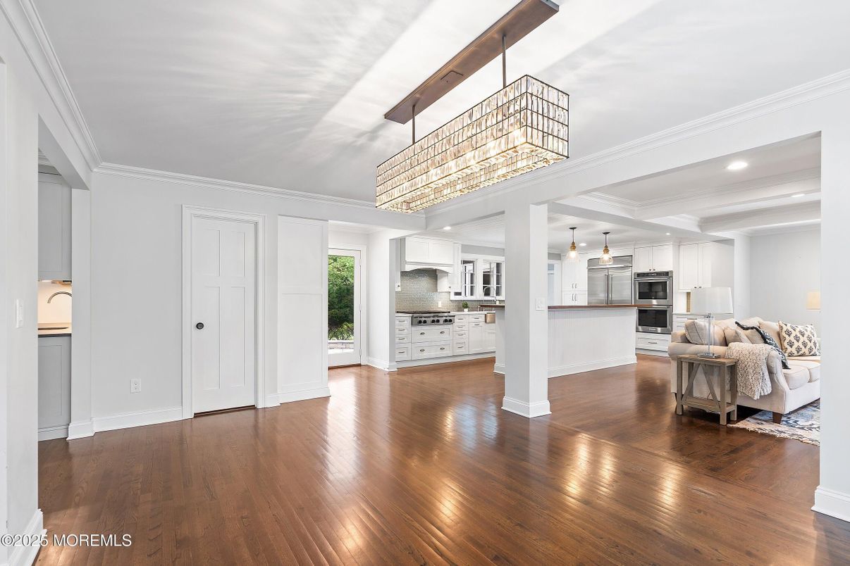 Chandelier, Interior, Kitchen, Living room, Recessed Lighting, Stainless Steel Appliances, Wood Texture Flooring