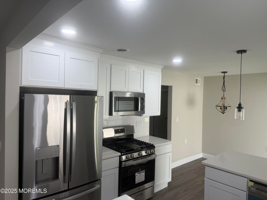 Interior, Kitchen, Pendant Lights, Recessed Lighting, Stainless Steel Appliances, Wood Texture Flooring