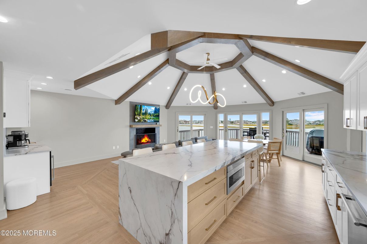 Dining room, Fireplace, Interior, Kitchen, Pendant Lights, Recessed Lighting, Wooden Beams, Wood Texture Flooring