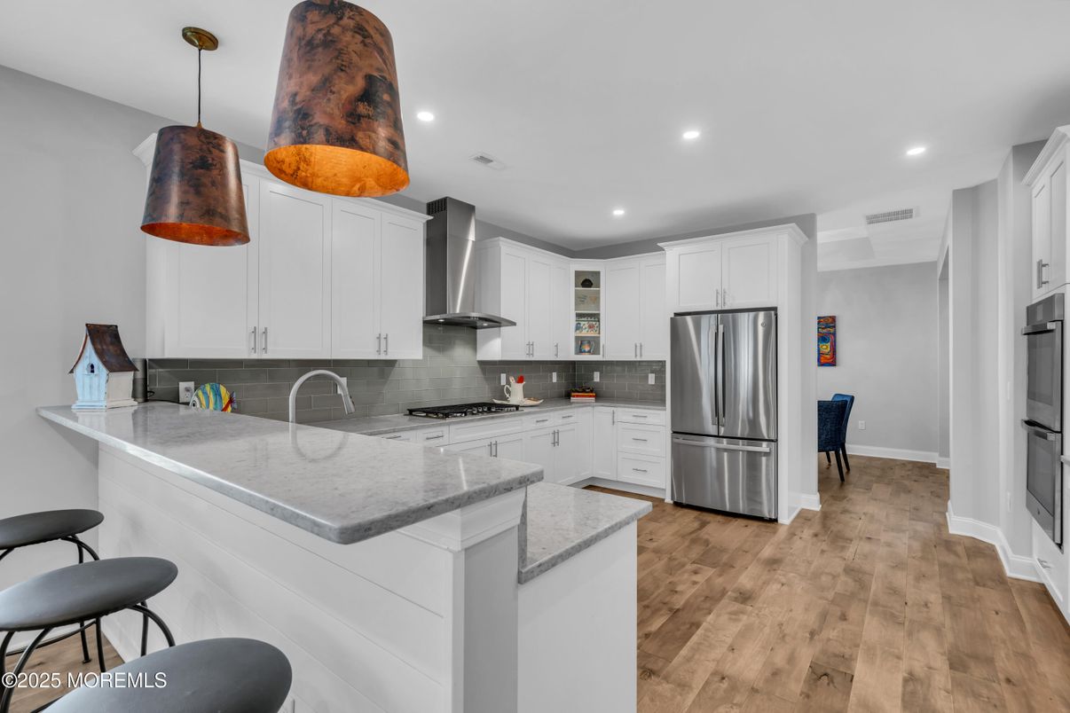 Interior, Kitchen, Pendant Lights, Recessed Lighting, Stainless Steel Appliances, Wood Texture Flooring