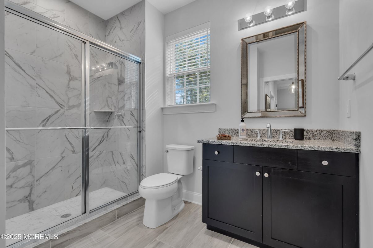 Bathroom, Glass Shower, Interior, Marble Walls, Wood Texture Flooring